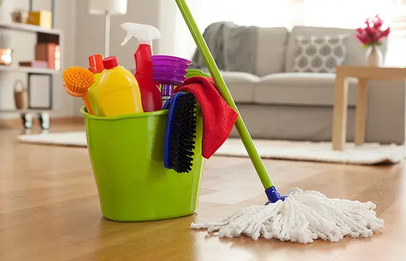 Cleaning equipments brush, mop a bucket full of detergents