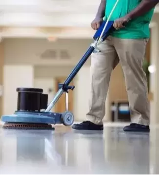 Commercial cleaning scrubbing floors with heavy duty machine